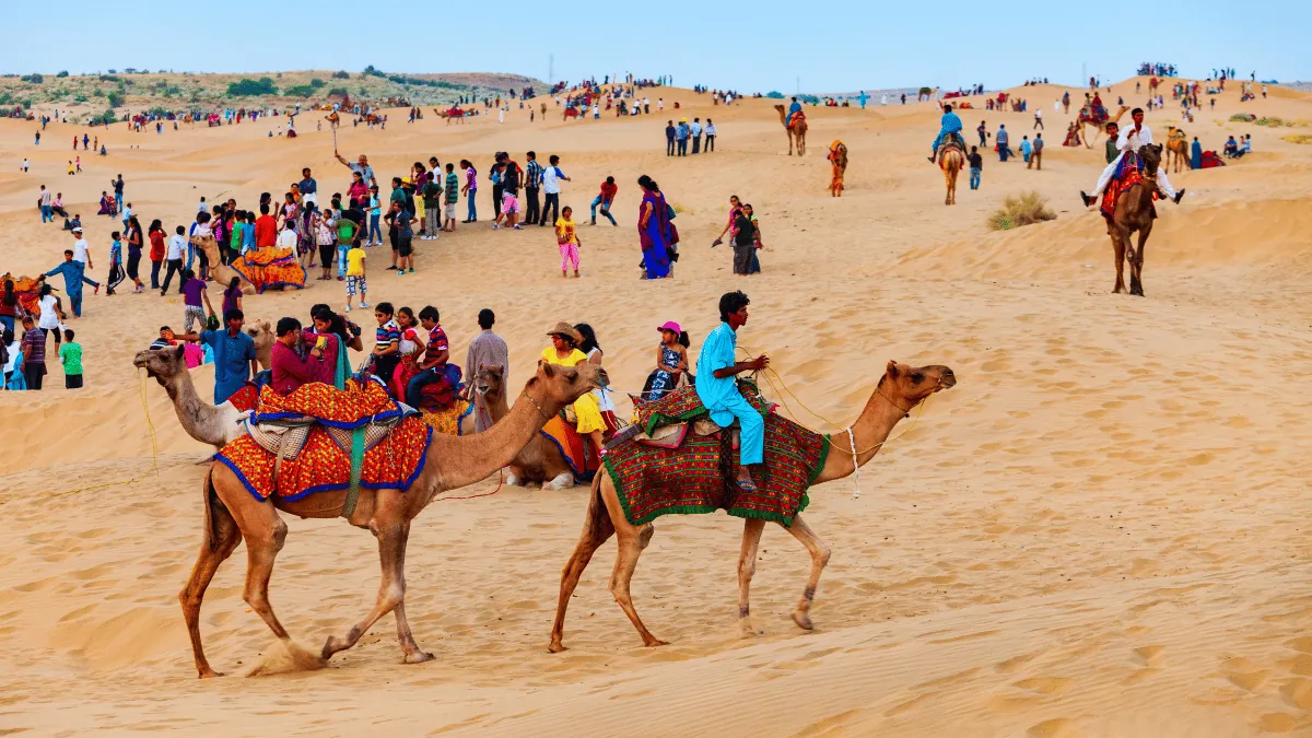 Camel ride trekking in mountains and Dunes