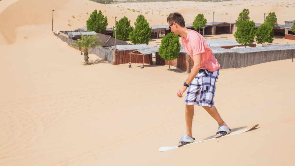 sandboarding on the dunes